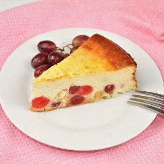 The Best Russian Cheesecake Recipe - Served on Plate With Grapes