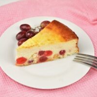 The Best Russian Cheesecake Recipe - Served on Plate With Grapes