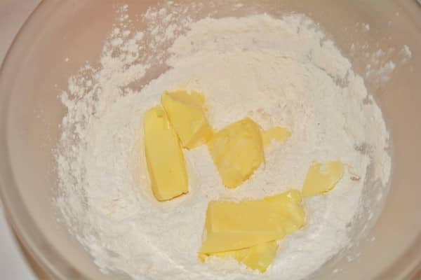 Traditional Baked Cheesecake Recipe-Wheat Flour and Butter in the Mixing Bowl