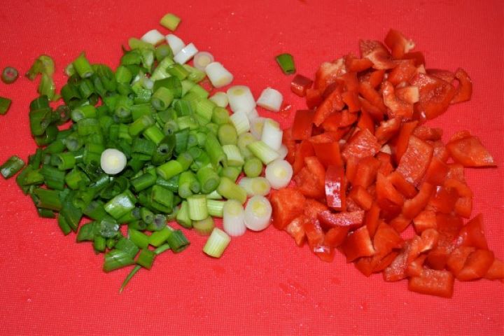 Simple Tuna And Pasta Salad Recipe - Chopped Spring Onions and Bell Pepper Chopped Spring Onions and Bell Pepper on the Chopping Board