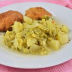 Best Sauteed Savoy Cabbage Recipe-Served on Plate With Breaded Turkey Breast