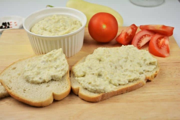 Grilled Eggplant Dip Recipe-Served With Bread and Tomatoes Romanian Eggplant Dip Served With Bread and Tomatoes on the Wooden Chopping Board