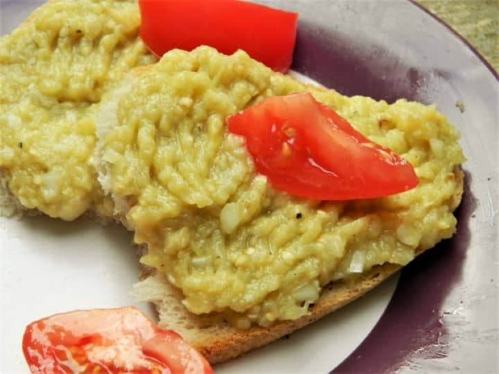 Grilled Eggplant Dip Recipe-Served With Bread and Tomatoes Romanian Eggplant Dip Without Mayonnaise Served With Bread and Tomatoes on the Plate