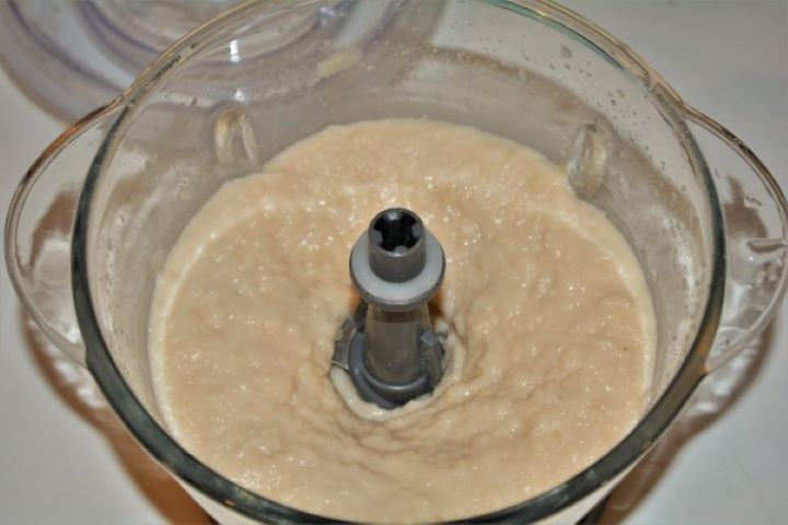 Easy Homemade Refried Beans Recipe-Mashed White Beans in the Electric Chopper Blending canned white beans in a food processor to create a silky, smooth homogeneous puree.