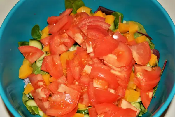 Best Leftover Turkey Salad Recipe-Sliced Tomatoes Over Ingredients in the Bowl