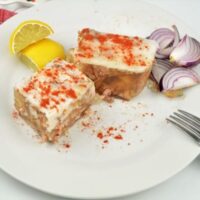 Best Meat Jelly Recipe-Served on Plate With Red Onions