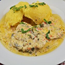 Creamy Pork Stew Recipe-Served on Plate With Polenta