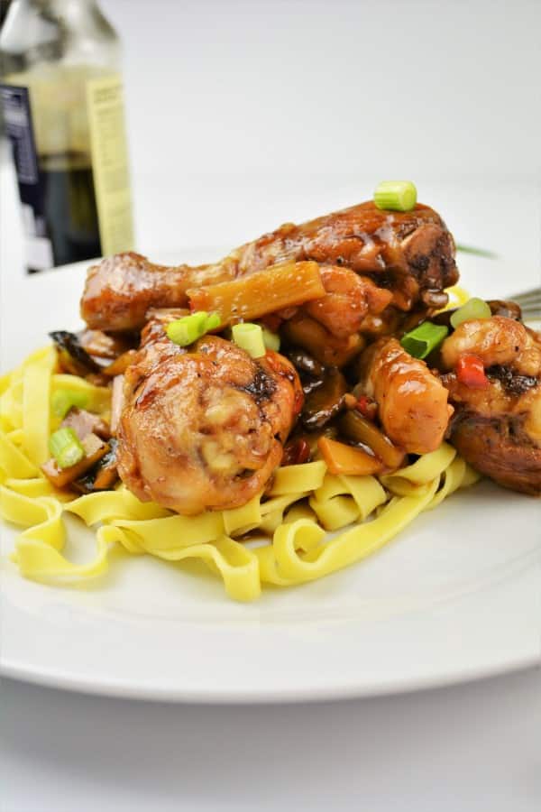 Easiest Teriyaki Chicken Recipe-Served on Plate With Tagliatelle and With Chopped Spring Onions