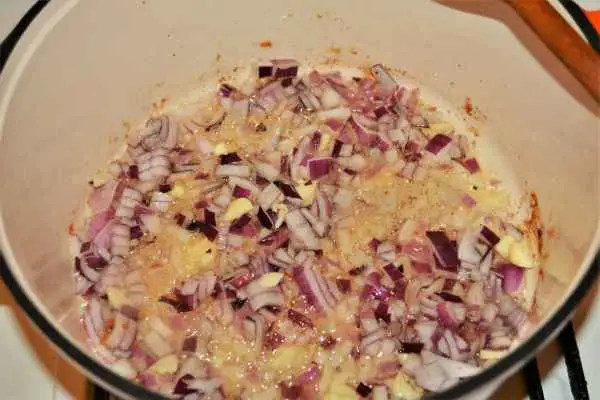 Best Chicken Casserole Recipe-Frying Chopped Onion and Garlic in the Pot