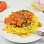 Best Chicken Casserole Recipe-Served on Plate With Tagliatelle and Parsley on Top