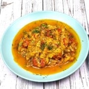 Grated Summer Squash Stew Served on Blue Plate