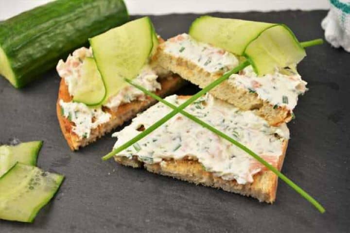 Best Smoked Salmon Cream Cheese Recipe-Served on Toast With Cucumber Thin Slices Toasted bread generously spread with homemade smoked salmon cream cheese and topped with fresh dill.