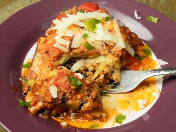 Best Eggplant Casserole Recipe-Served on Plate With Grated Pecorino on Top
