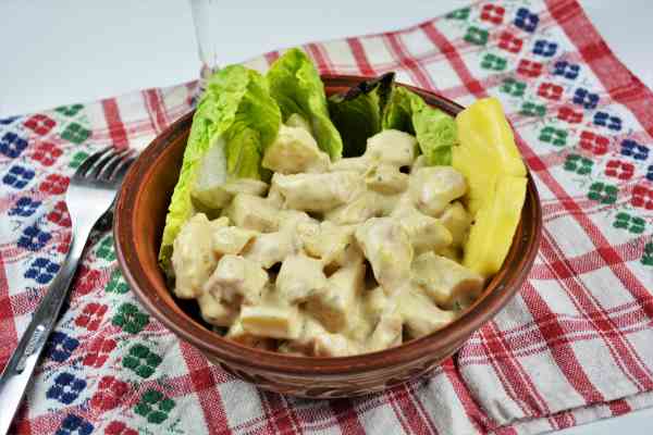Chicken Breast With Pineapple-Served in Bowl Garnished With Lettuce and Pineapple Slices