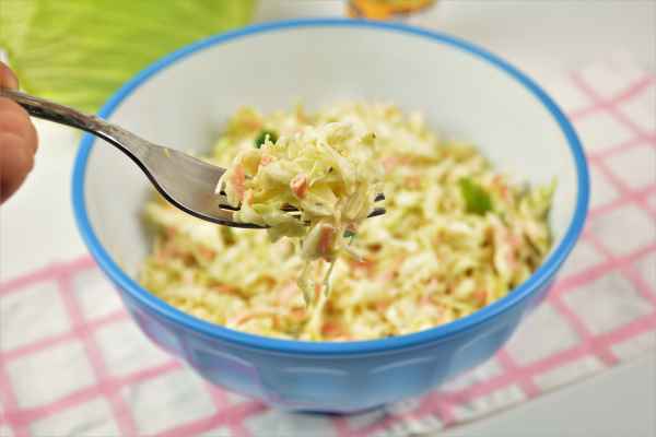 Quick and Easy Homemade Coleslaw Recipe-Served in a Bowl With a Fork
