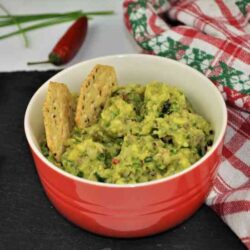 Best Homemade Guacamole Recipe-Served in Bowl With Crackers