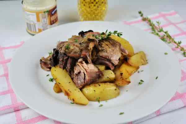 Braised Pork Knuckle Recipe-Served On Plate With Baked Potatoes