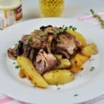 Braised Pork Knuckle Recipe-Served On Plate With Baked Potatoes