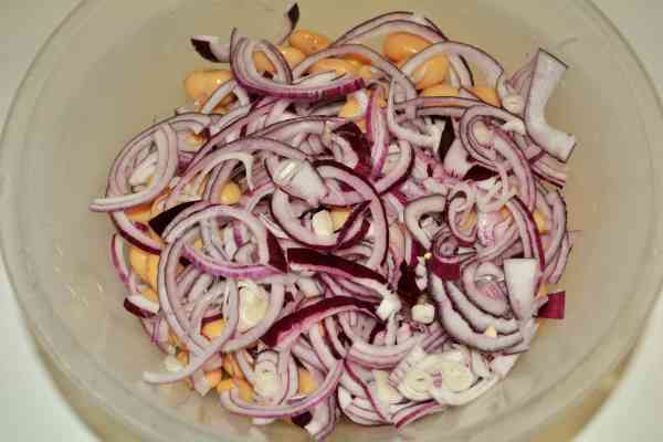 Butter Beans Salad Recipe-Sliced Red Onion on the Drained Beans in the Bowl