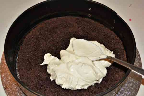 Easy Black Forest Cake Recipe-Spread the Whipped Cream Over the First Cake Layer