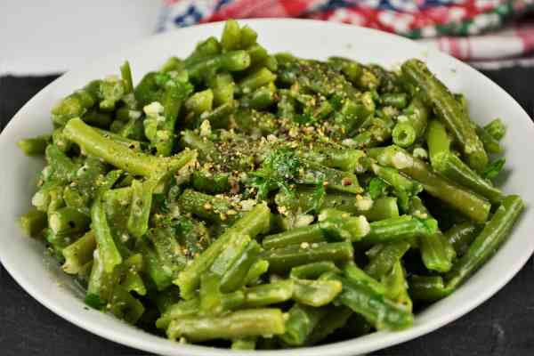 Green Bean Salad With Garlic Cream-Served in Bowl With Ground Pepper on Top
