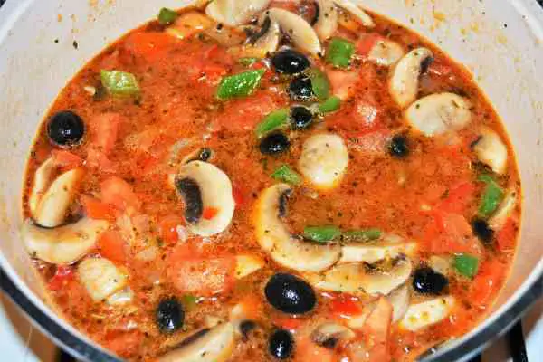 Best Turkey Cacciatore Recipe-Simmering Mushrooms and Vegetables in the Pot