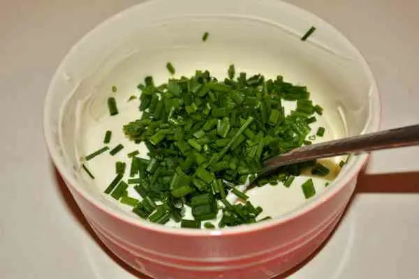 Homemade Hash Browns Recipe-Greek Yoghurt and Chopped Chives in the Bowl