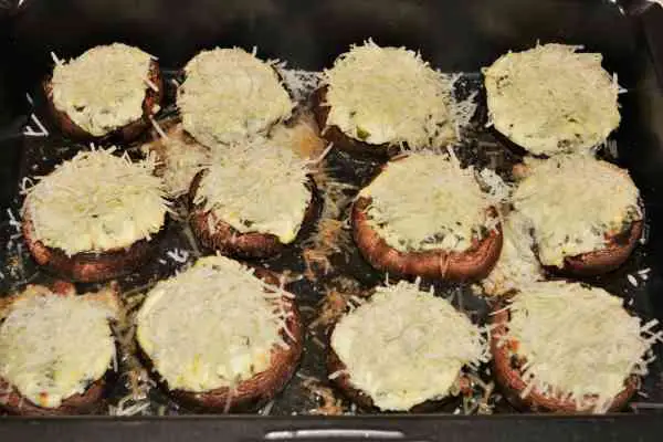 Stuffed Mushrooms With Cheese and Bacon-Half Baked Stuffed Mushrooms With Grated Grana Padano on Top