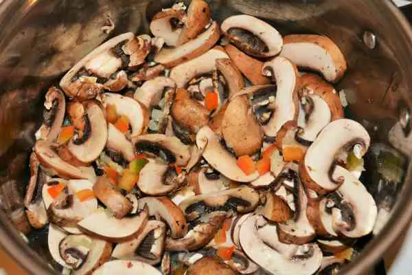 Best Mushroom Soup Recipe-Frying Sliced Mushrooms, Chopped Onions and Bell Pepper in the Pot