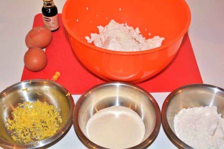 Best Cottage Cheese Dumplings-Ingredients Ingredients for Hungarian cottage cheese dumplings including curd cheese, semolina, flour, eggs, and lemon zest.