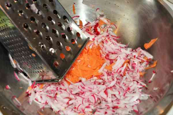 Mediterranean Cabbage Salad Recipe-Grated Radish and Carrots in the Bowl
