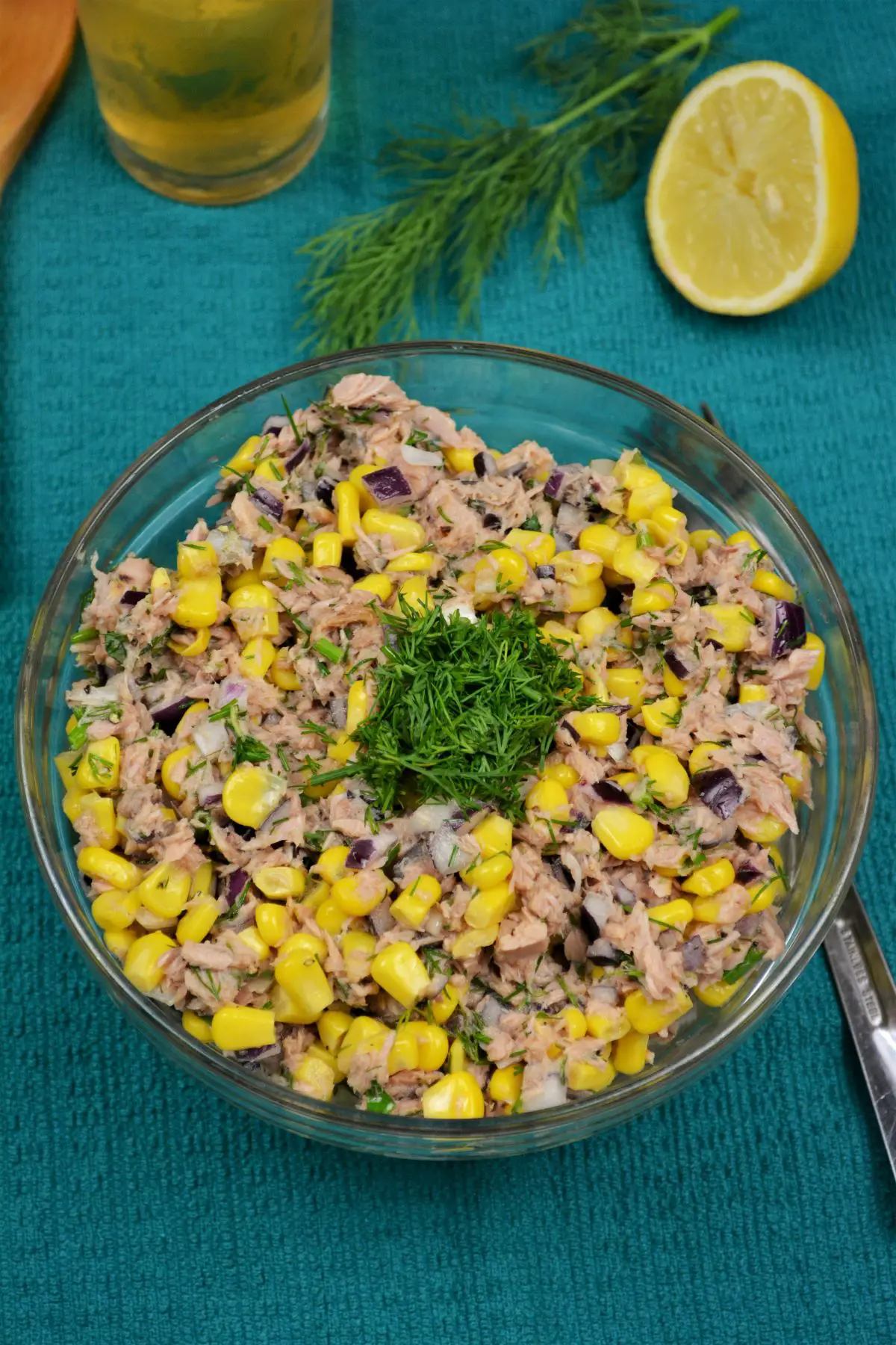Tuna Corn Salad Recipe-Served in a Bowl, With Lemon and a Glass of Beer