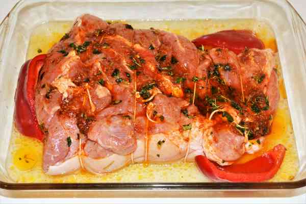 Slow-Cooked Pork Shoulder in the Oven-Seasoned Pork Shoulder and Peppers in the Baking Tray Ready to Cook