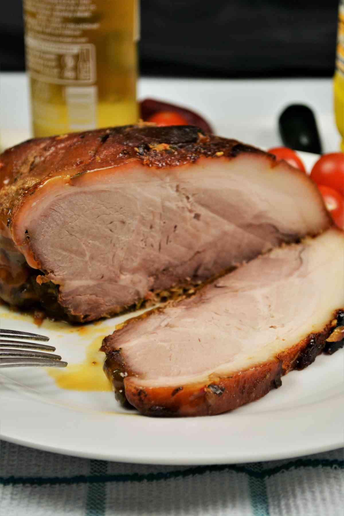 Slow-Cooked Pork Shoulder in the Oven-Sliced and Served on Plate With Mustard and Bread