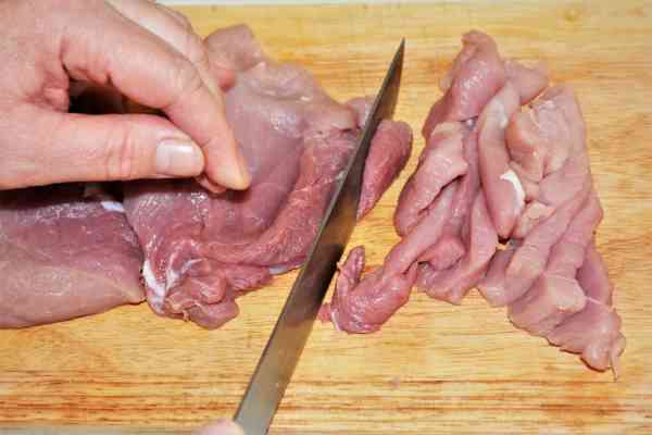 Brasov Roast Recipe-Cuting Pork Meat Into Strips