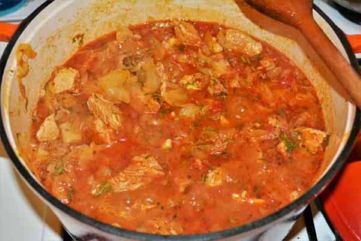 Turkey Cabbage Stew Recipe-Ready to Serve Finished one-pot turkey cabbage stew recipe simmering in rich tomato and paprika broth.