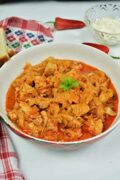 Turkey Cabbage Stew Recipe-Served in Bowl With Bread and Sour Cream