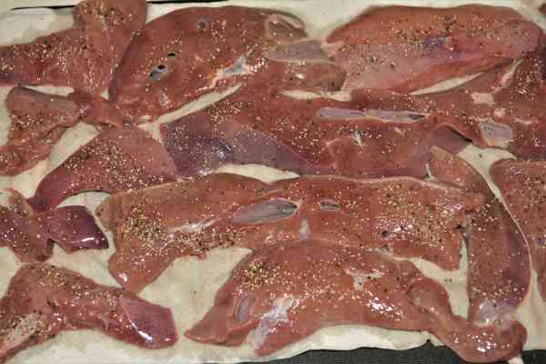 Fried Pork Liver Recipe-Pork Liver Slices Drying on Paper Towel and Seasoned With Ground Pepper