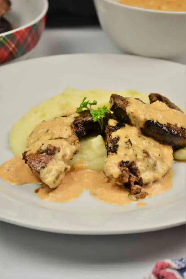 Fried Pork Liver Recipe-Served on Plate With Mashed Potatoes and Garlic Sauce