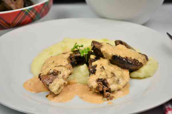 Fried Pork Liver Recipe-Served on Plate With Mashed Potatoes and Garlic Sauce