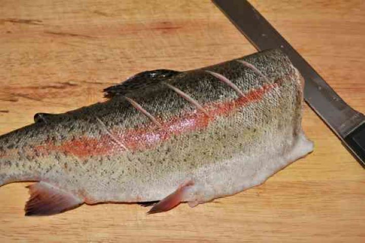 Pan-Fried Rainbow Trout Recipe-Notched Trout Notched Rainbow Trout on Chopping Board