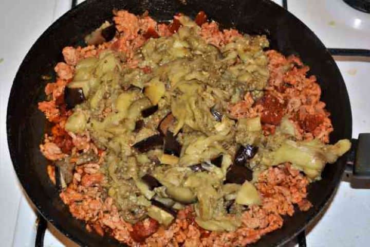 Stuffed Aubergines Recipe-Chopped Aubergines Pulp Over Simmering Mince Chopped Aubergines Pulp Over Simmering Mince