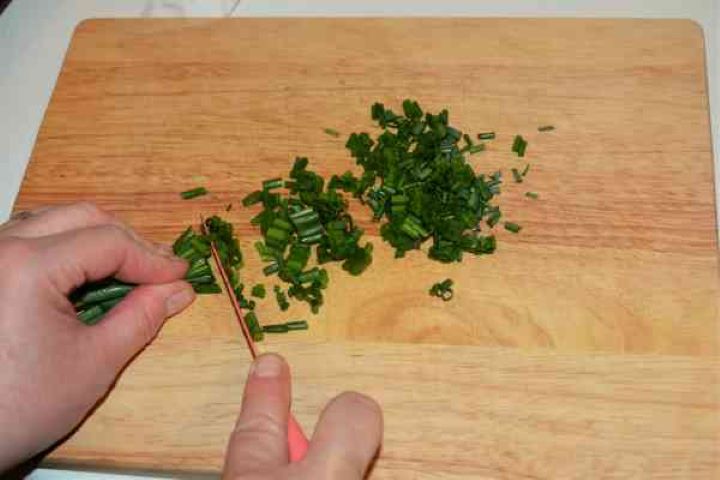 Stuffed Aubergines Recipe-Chopping the Chives Chopping the Chives on the Chopping Board