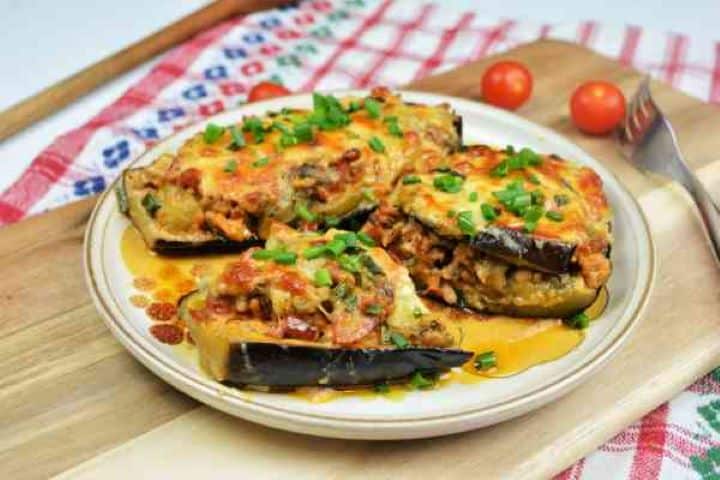 Stuffed Aubergines Recipe-Stuffed Aubergines Served on Plate Pork Stuffed Aubergines Served on a Rustic Plate