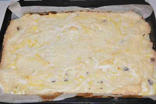 Noodle Kugel With Raisins-Baked Cake in the Tray Ready to Serve