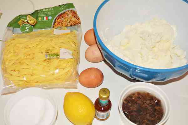 Noodle Kugel With Raisins-Fresh Tagliatelle, Cheese Cream, Eggs, Sugar, Raisins and Vanilla Extract