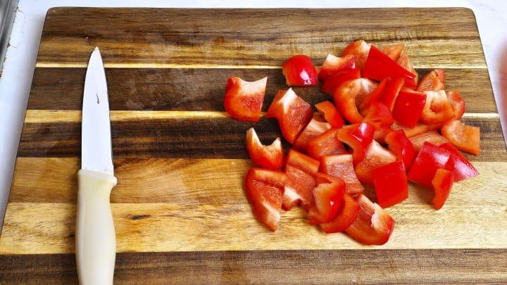 Meatloaf Pate Recipe-Cut in Cubes Red Pepper Cut Red Pepper on the Chopping Board