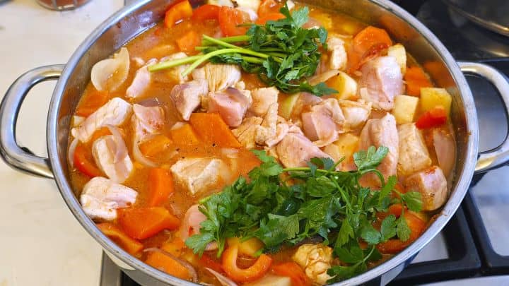 Meatloaf Pate Recipe-Simmering the Stew in the Dutch Oven Simmering Meat and Vegetables in the Pan