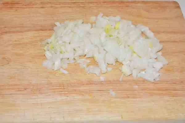 Hungarian Stuffed Peppers-Chopped Onion on Chopping Board