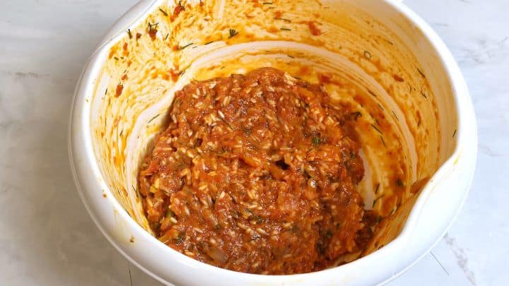 Hungarian Stuffed Peppers-One Egg on the Pepper Filling in the Bowl Remained Stuffing Mixed With Egg in the Bowl